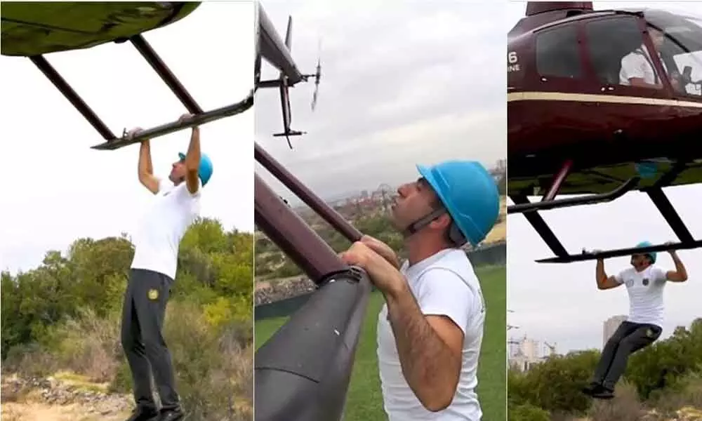 Man From Armenia Holds New Guinness World Record For  Doing Pull-Ups From Helicopter