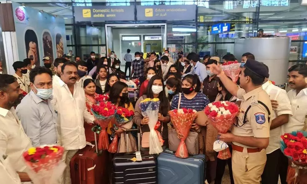15 Telangana students who arrived from Ukraine being received at the Hyderabad airport on Sunday morning