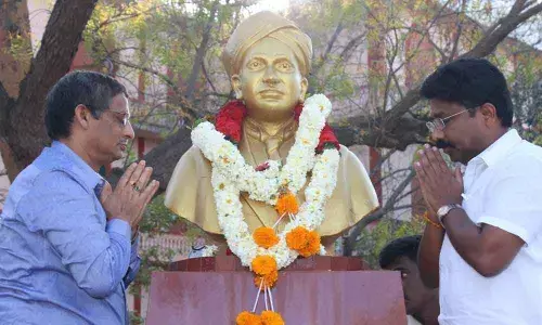 Minister Dr Audimulapu Suresh paying tributes to Dr CV Raman at Dr Samuel George Engineering College in Markapuram on Monday