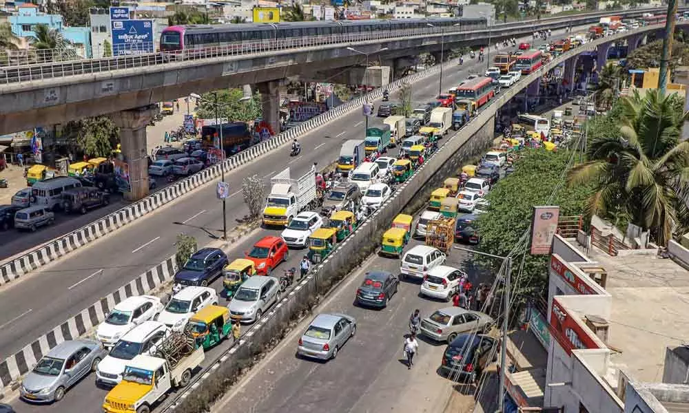 Heavy traffic on the Mysore road during Karnataka Pradesh Congress Committes padayatra from Mekedatu to Bengaluru demanding implementation of the project on Tuesday