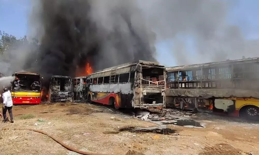 Fire personnel trying to put off fire