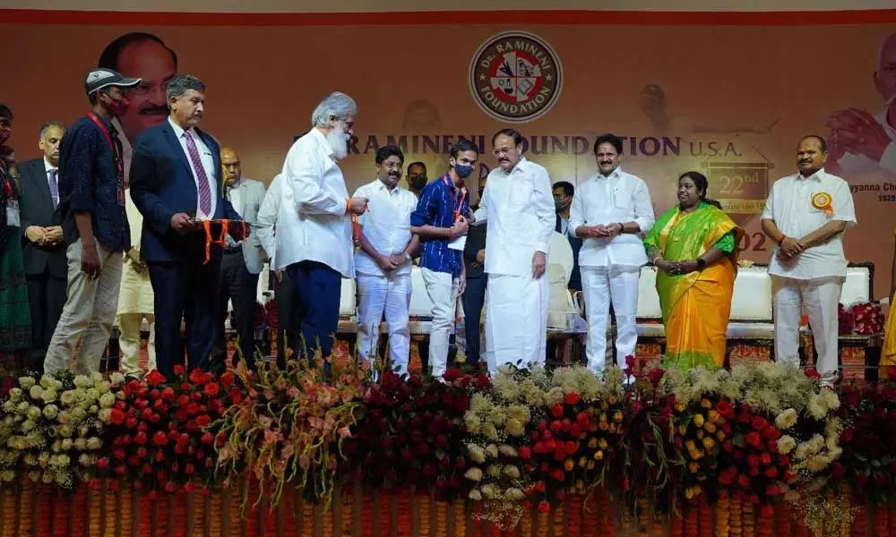 Vice President M Venkaiah Naidu participating in the award ceremony of Ramineni Foundation at Mangalagiri on Tuesday. MP Mopidevi Venkata Ramana, education minister A Suresh and others are also seen.