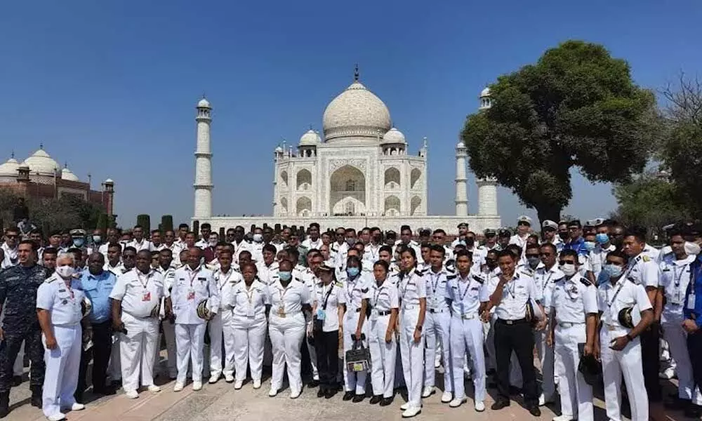 A group of delegates from friendly foreign countries visiting the Taj Mahal as a part of the guided tour organised during the multilateral exercise MILAN-2022