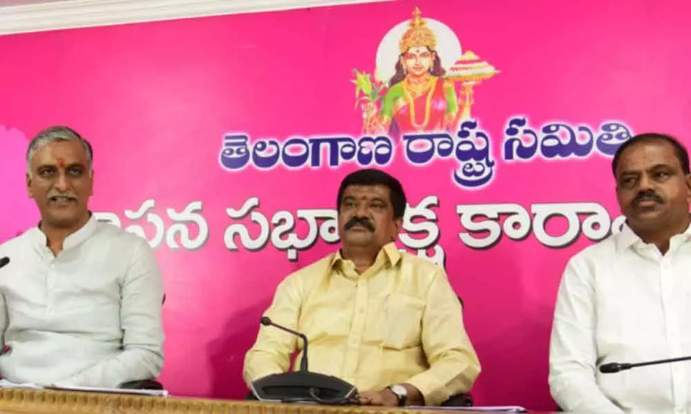 Finance Minister T Harish Rao along with Legislative Affairs Minister Vemula Prashanth Reddy addressing a press conference in city on Tuesday