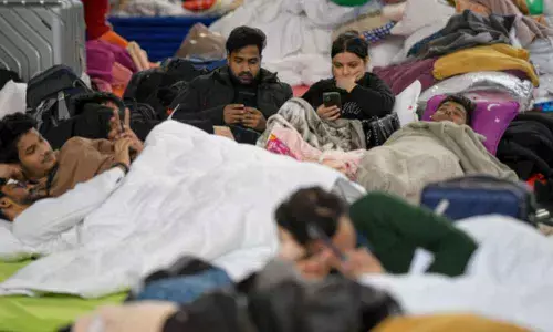 Students who fled the conflict from Ukraine rest in a refugee camp in Voluntari, Romania on Tuesday