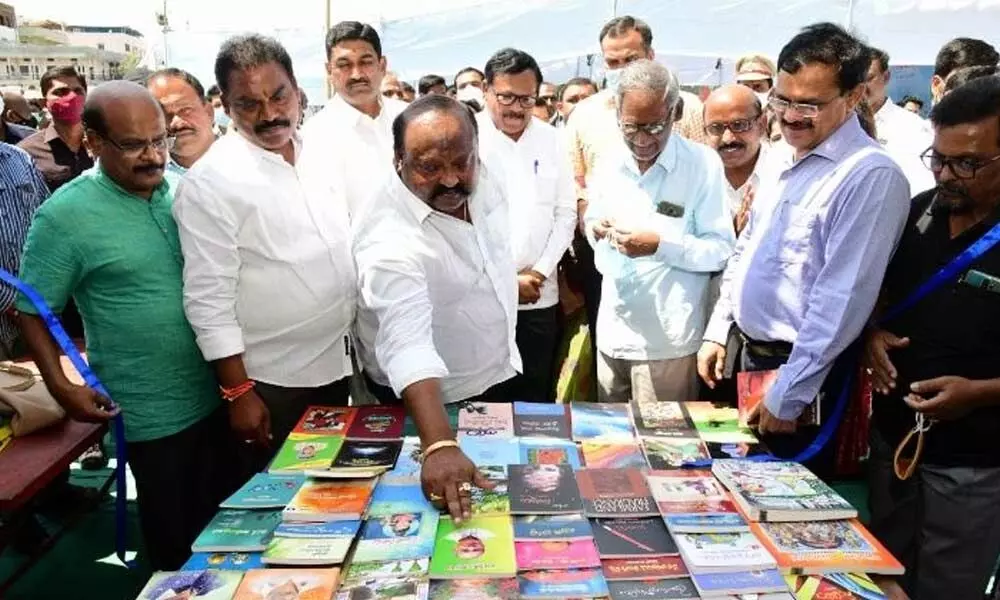 Civil Supplies Minister G Kamalakar speaking at a book fair inauguration in Karimnagar on Wednesday