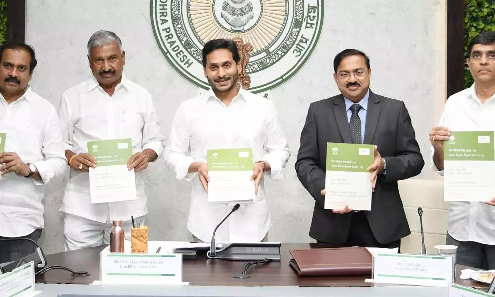 Chief Minister Y S Jagan Mohan Reddy along with ministers and officials, releases State Focus Paper-2022 at Credit Seminar in Tadepalli on Wednesday