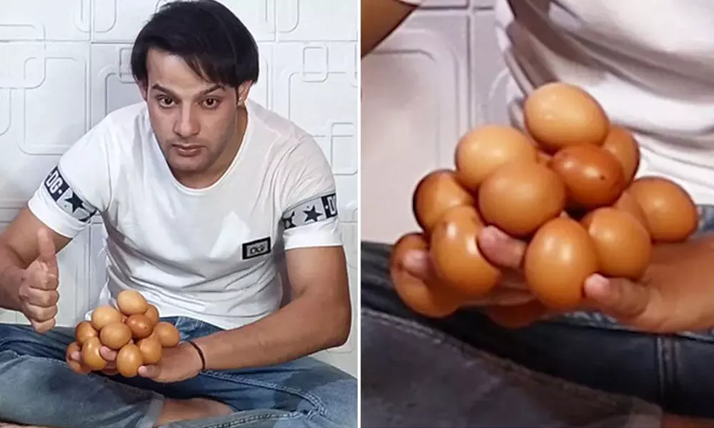 Man From Iraq Holds New Guinness World Record For Balancing 18 Eggs On The Back Of His Hand