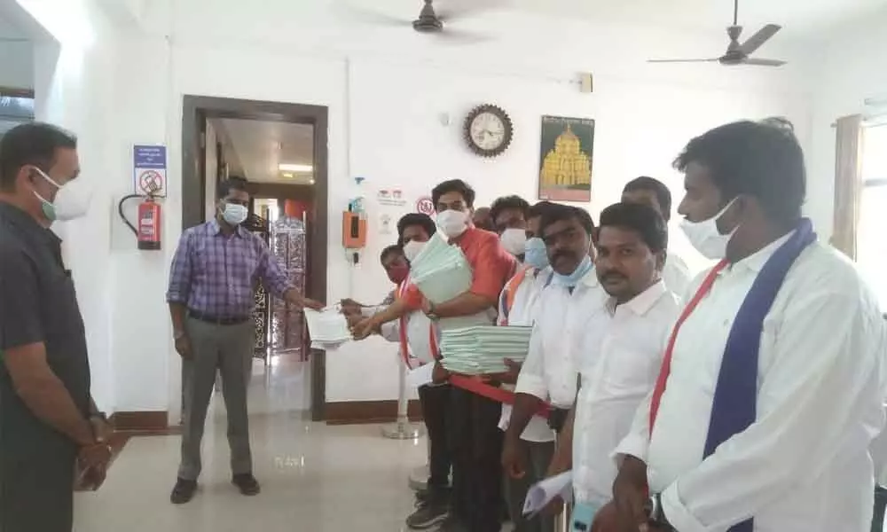 Madanapalli Zilla Sadhana Samithi leaders led by its convener P T M Siva Prasad submitting a representation in support of Madanapalli district to Collector M Hari Narayanan in Chittoor on Thursday