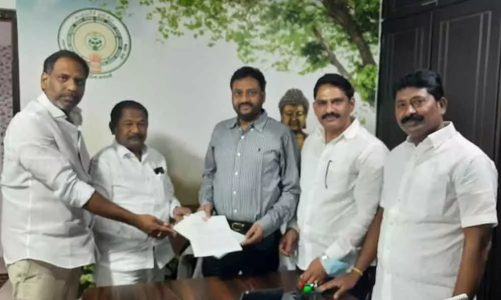 TDP leaders submitting a representation to GSRKR Vijay Kumar, principal secretary of planning department in Guntur on Thursday