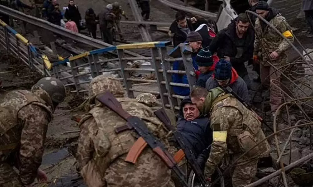 Hundreds of Men line up to join Ukrainian army