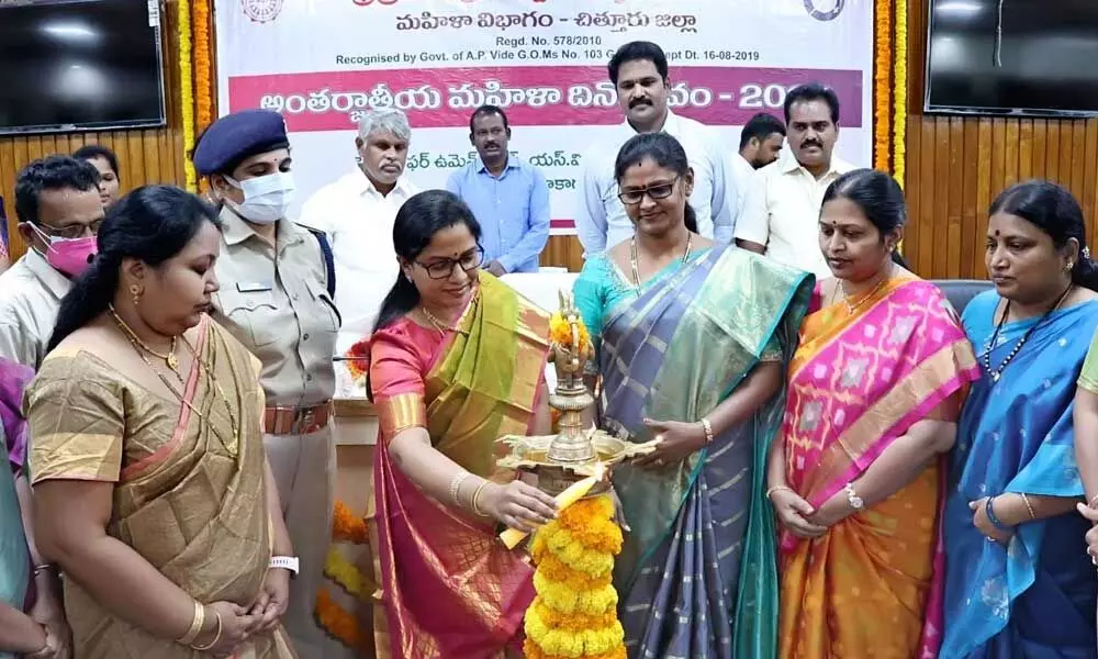Mayor Dr R Sirisha and Women’s Commission member Gajjala Lakshmi lighting the lamp to mark the inauguration of Women’s Day celebrations in Tirupati on Sunday