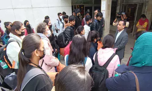 TS Resident Commissioner Gaurav Uppal receiving 105 Telangana students who arrived at TS Bhavan in New Delhi, from Ukraine, on Sunday