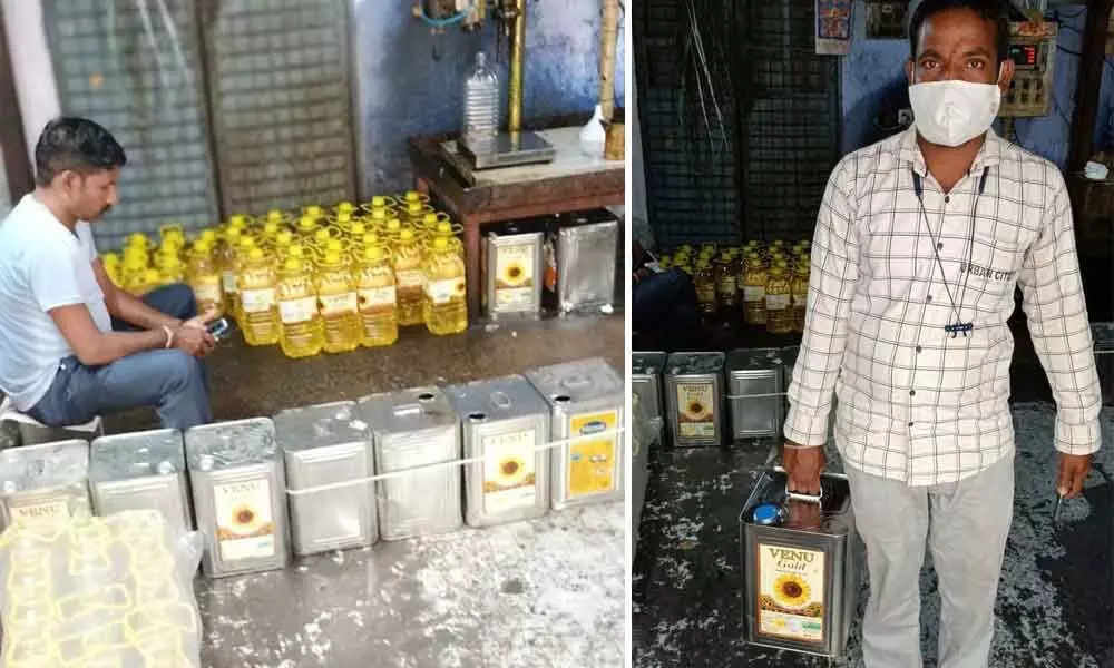 Wholesale oil sales outlet in Armor ; A scene of a consumer buying sunflower oil Thursday in Armor and taking it home.