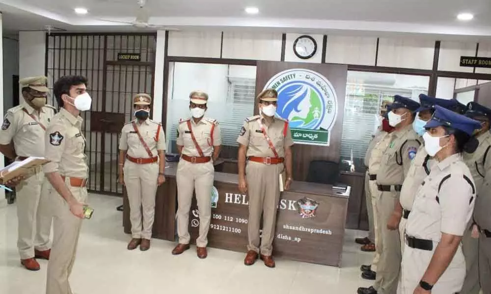 Rajamahendravaram Urban SP Aishwarya Rastogi enquiring the working at women police station in Rajamahendravaram on MondayT