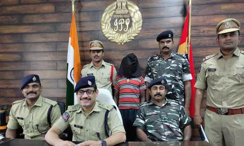 SP Sunil Dutt  revealing the details of arrested one Maoist in his office to media people on Monday at Kothagudem