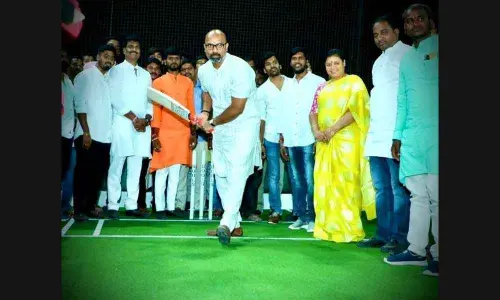 Nizamabad MP Dharmapuri Arvind playing a shot at the SB Box Cricket Stadium after the inauguration at Gurramguda Chowrasta in Badangpet on Sunday