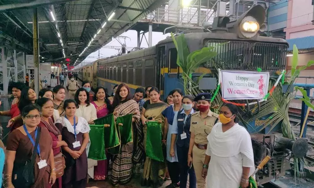 ECoRWWO members cheer all-women crew by flagging off the special train in Visakhapatnam on Tuesday
