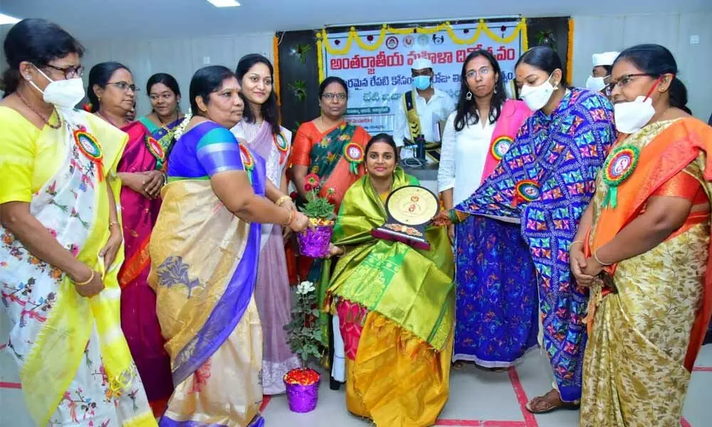 Joint Collector Dr Attada Siri being felicitated by Collector Nagalakshmi Selvarajan on the occasion of International Womens Day in Anantapur on Tuesday