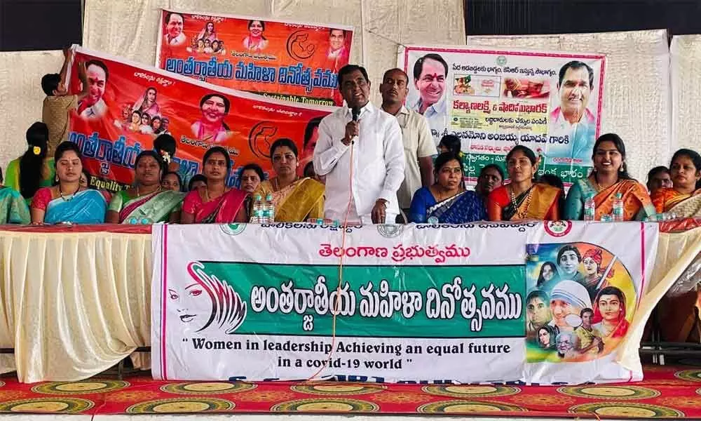 MLA Anjaiah Yadav addressing the gathering during Women’s Day celebrations held at Kuntla Ramreddy Garden in Shadnagar on Tuesday