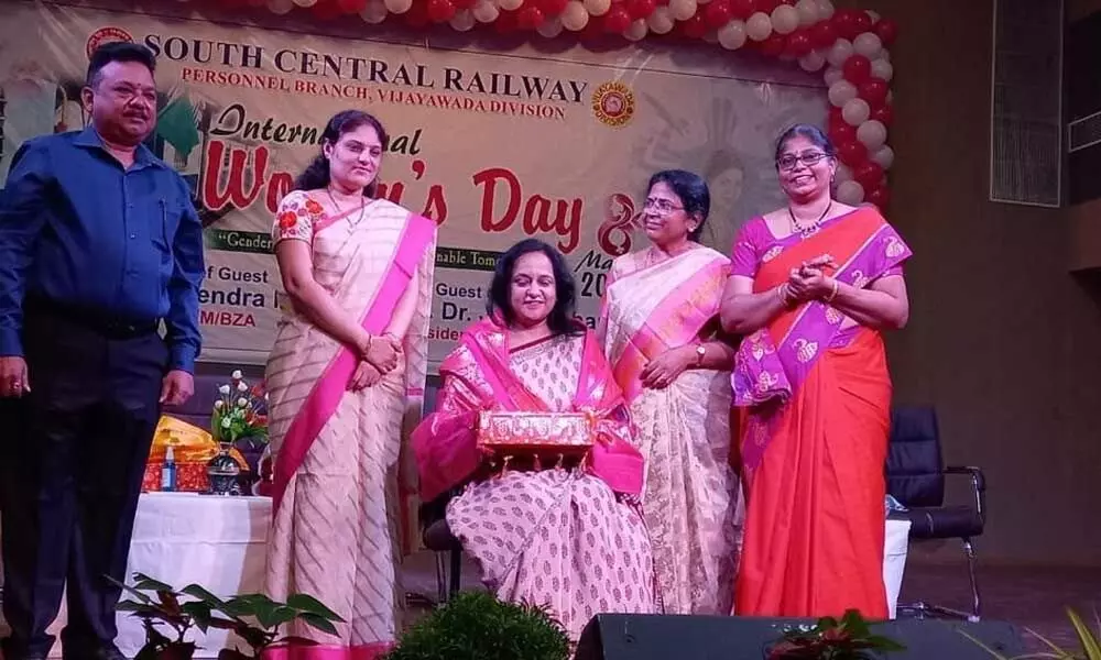 Felicitation of women employees of railway department at Divisional Railway Auditorium in Vijayawada on Tuesday