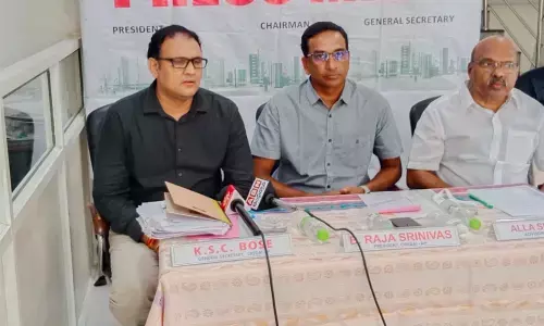 CREDAI AP members speaking at a press meet in Vijayawada on Tuesday