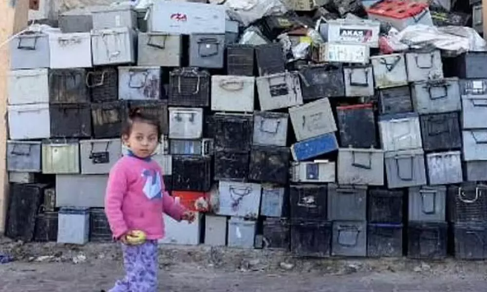 Mounds of old batteries threaten Gaza health