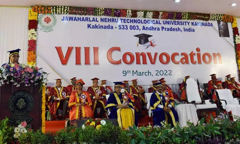 Dignitary speaking at 8th convocation of JNTU-K on university campus in Kakinada on Wednesday
