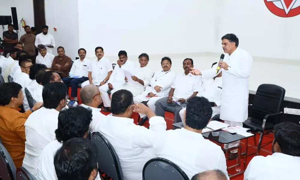 Jana Sena Party PAC chairman Nadendla Manohar addressing the members of 12 committees formed to organise party formation day meeting, at party office in Mangalagiri on Wednesday