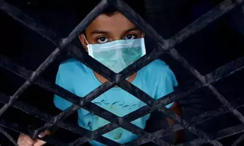 China locks down city of 9 million amid new spike in cases