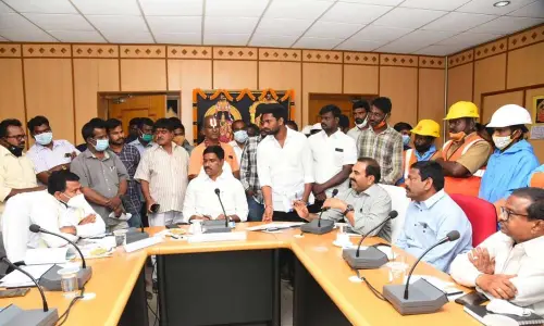 Chairman of National Commission for Safai Karamcharis M Venkatesan holds review meeting in Tirupati on Saturday. TTD JEO V Veerabrahmam and Corporation Deputy Commissioner Chandramouleeswar Reddy are also seen.