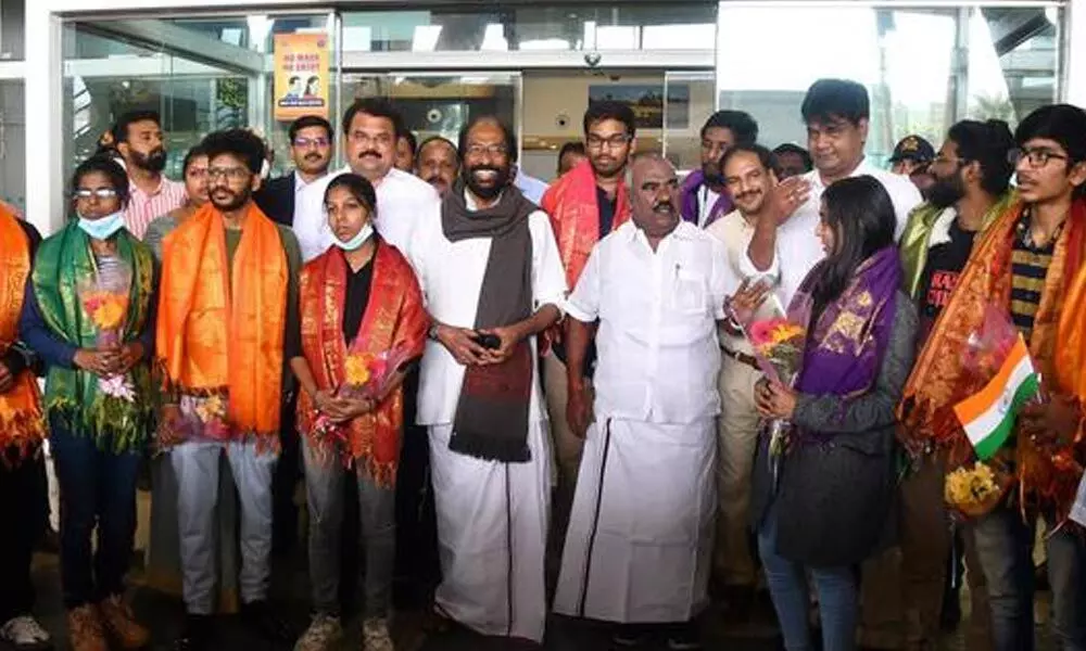 The Tamil Nadu evacuation team, led by Trichy Siva, MP, with the students who arrived at Chennai airport on Saturday.