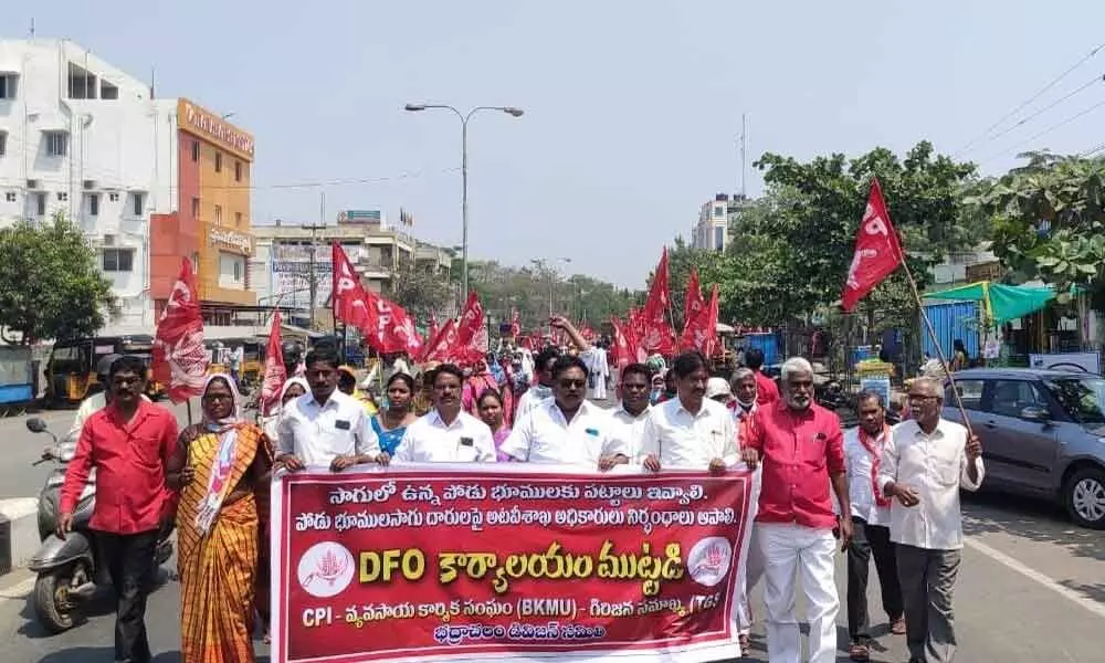 Poduland farmers taking out a rally, demand pattas for their lands, in Bhadrachalam on Monday.