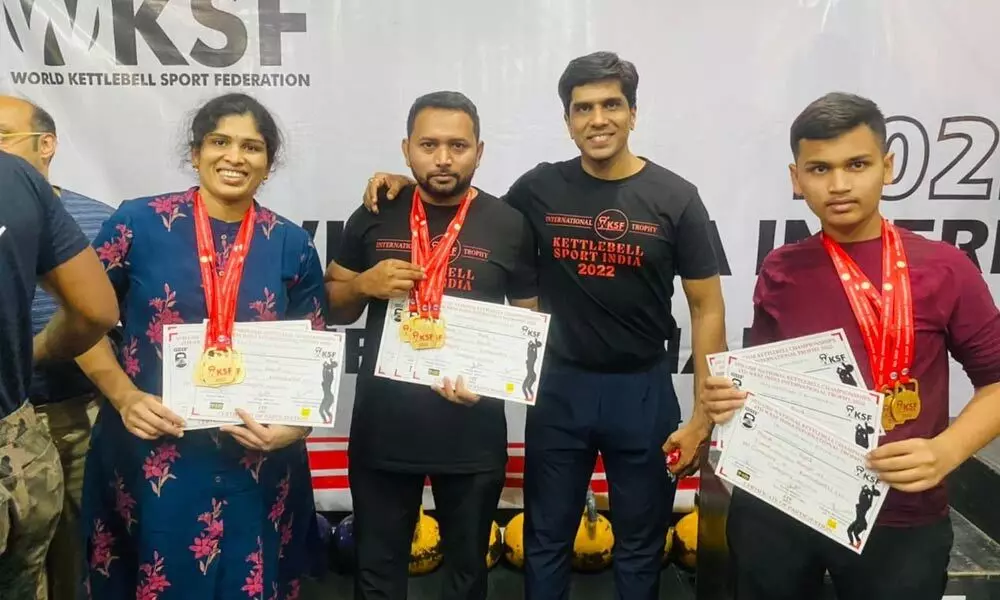 Javeed Ahmed Md (Andhra team secretary and coach and participant), Dr Ch Neelima and Md Anas, who bagged gold medals at national-level Kettlebell competition held in Mumbai