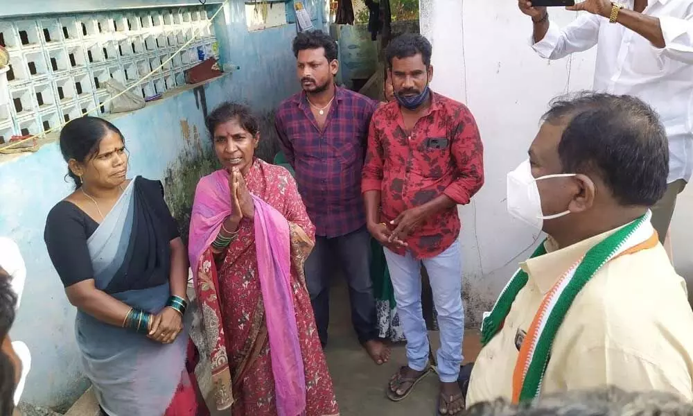 APCC chief Dr S Sailajanath interacting with the family members of victims at Jangareddigudem on Wednesday