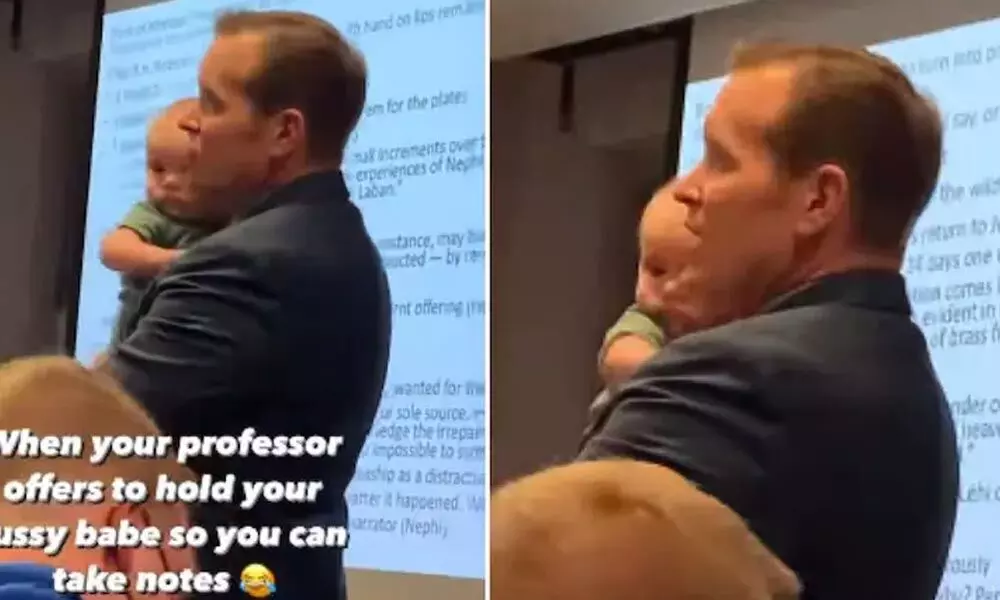 Watch The Trending Video Of A Professor Taking Care Of Students Baby While Giving Lecture