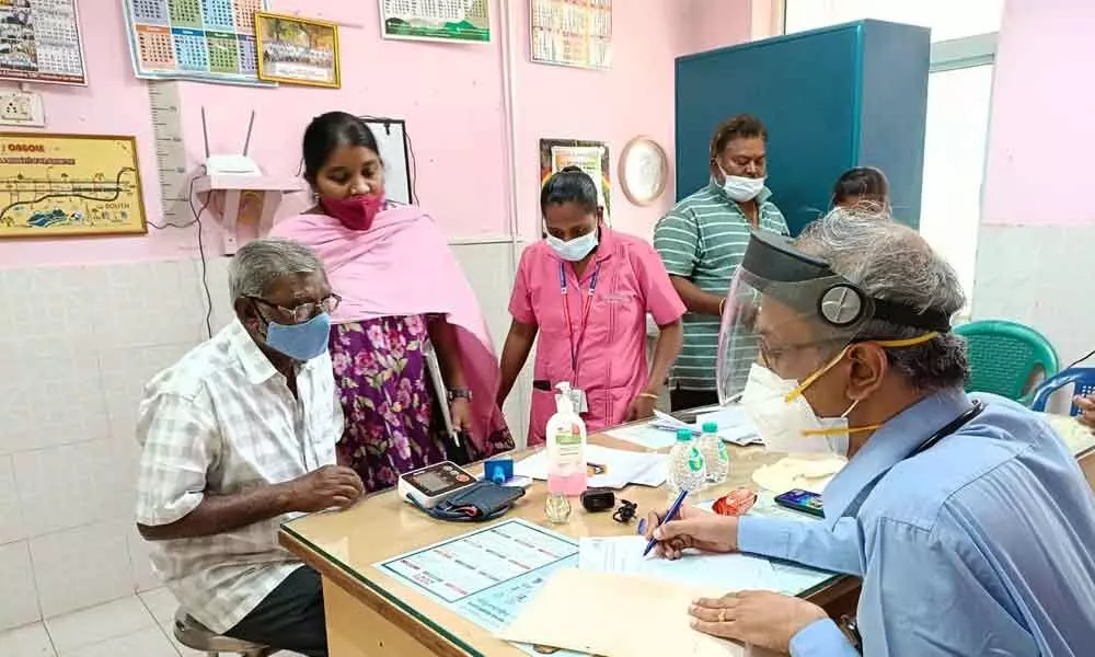 Retired railway employees getting screened at a health camp organised by Ramesh Sanghamitra Hospital in Ongole on Thursday