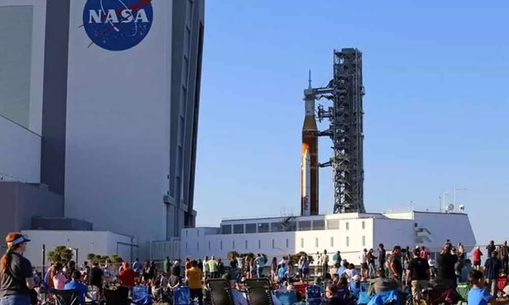 NASAs big, new moon rocket begins rollout en route to launch pad tests