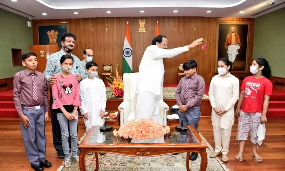 Vice-President celebrates Holi with schoolchildren at his residence