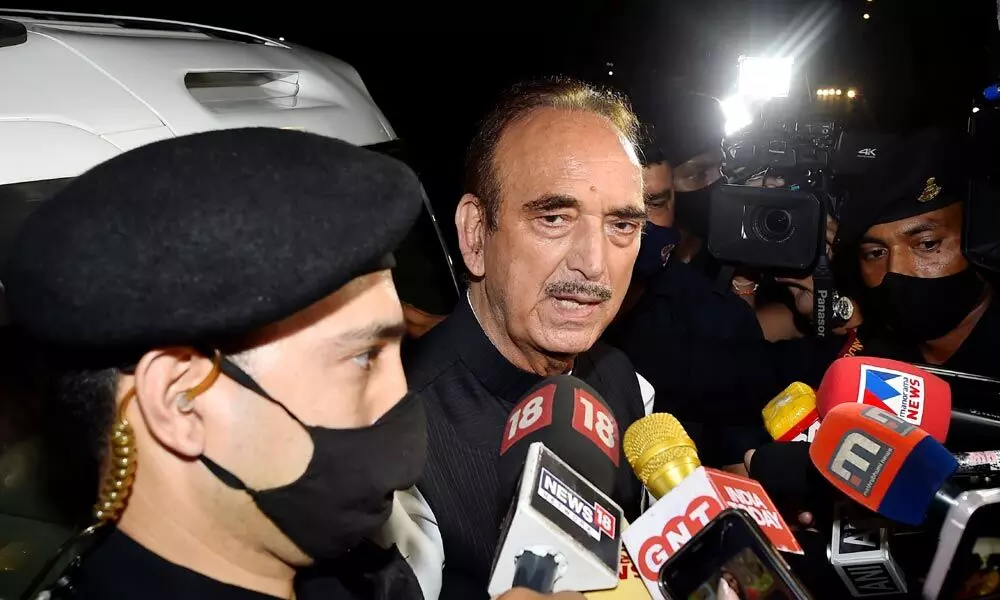 Senior Congress leader Ghulam Nabi Azad talks to the media after his meeting with Congress interim president Sonia Gandhi, at her residence in New Delhi on Friday