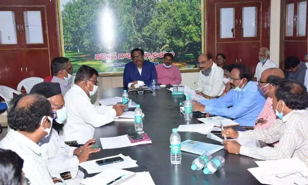 District Collector S Venkat Rao during a review with the concerned officials on the resettlement and rehabilitation works of Udandapur ousters at the Collectorate in Mahabubnagar on Saturday
