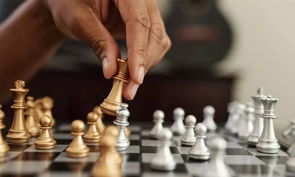 Sarojini Academy felicitates chess wizard Praneeth
