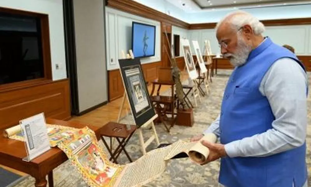 Prime Minister Narendra Modi inspects antiquities repatriated from Australia, in New Delhi on Monday