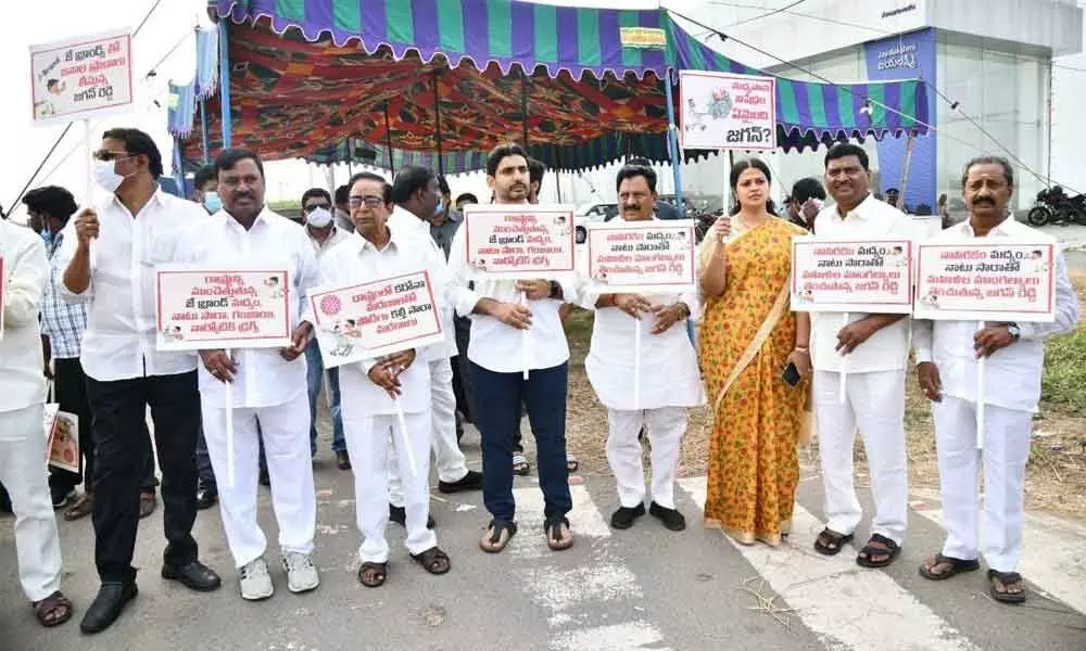 TDP MLAs, MLCs staging a protest at the Assembly at Velagapudi on Monday against the sale of spurious liquor in the State