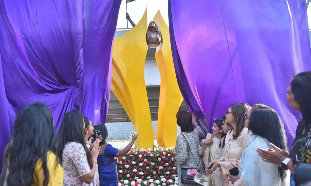 YFLO unveils 20-ft Statue of Empowerment & Glory