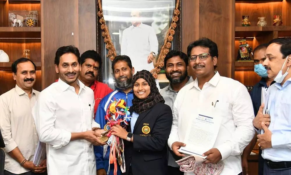 Asian Powerlifting Championship winner Sheik Sadiya Almas meeting Chief Minister YS Jagan Mohan Reddy at his office in the State Assembly at Velagapudi on Tuesday