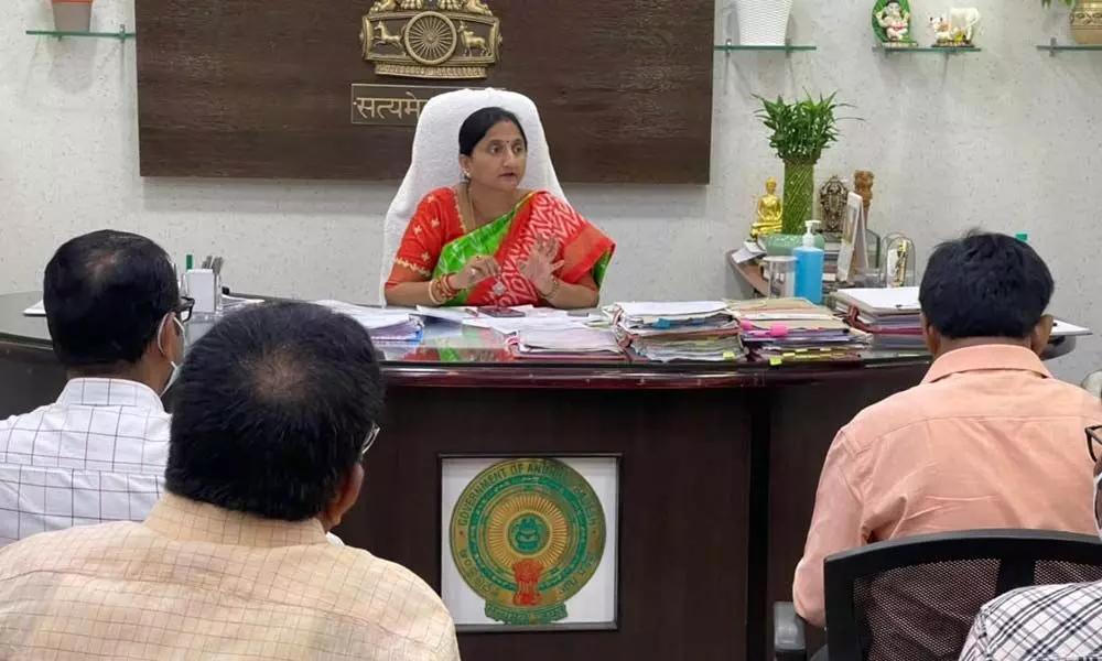 Joint Collector Dr K Madhavi Latha at a meeting with the officials of marketing and civil supplies departments at her chambers in Vijayawada on Tuesday