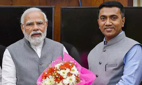 Narendra Modi with Pramod Sawant