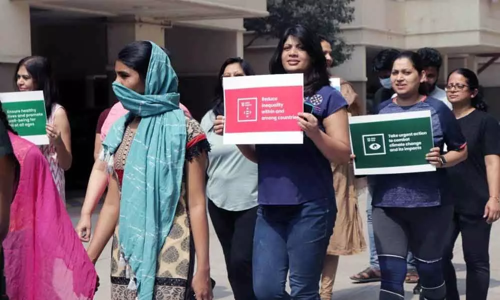 Women walk to bring awareness on menstrual hygiene