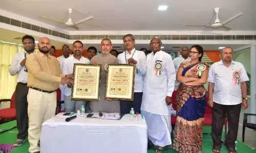 KDCC Bank showing the certificates received from ISO in Karimnagar on Wednesday